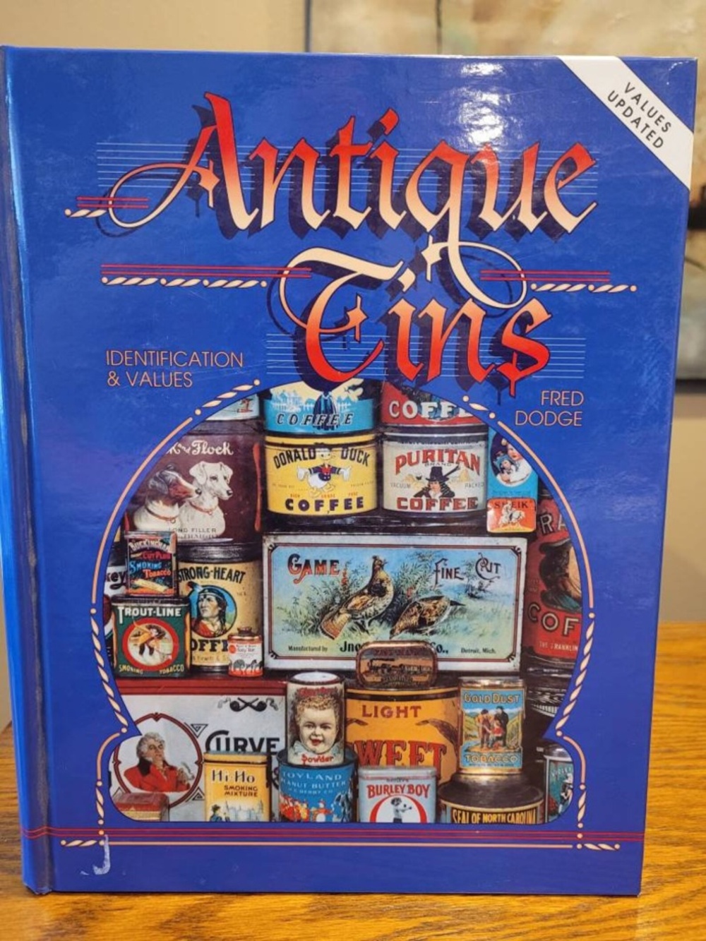 Vintage book on antique tin collecting. Hardcover - Collectors